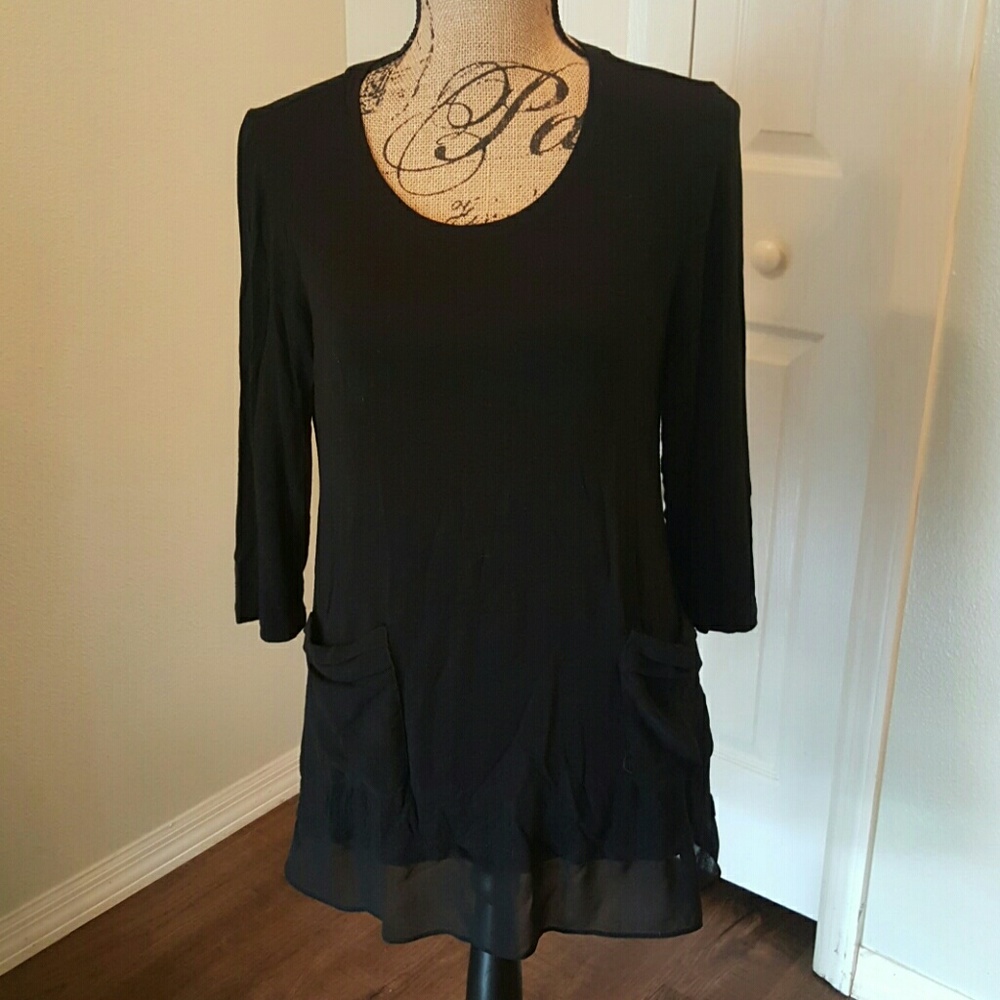 Logo by Lori Goldstein tunic